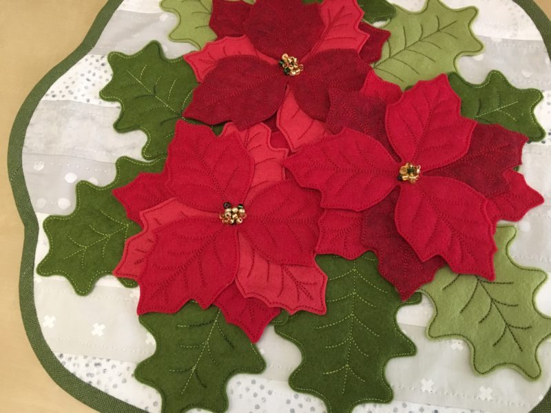 felt poinsettias and holly leaves