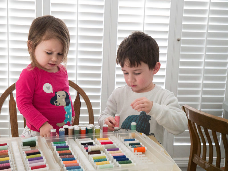 kids playing with sulky threads